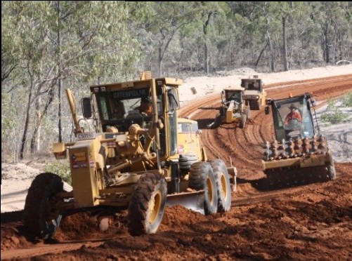 Vision Constructions grader and roller forming a remote road