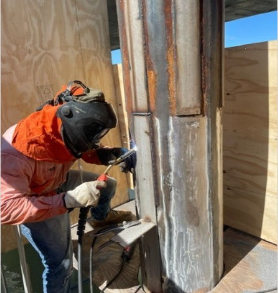 Jetty Guide Pile Repairs — seal welding stainless flat bar around a pile